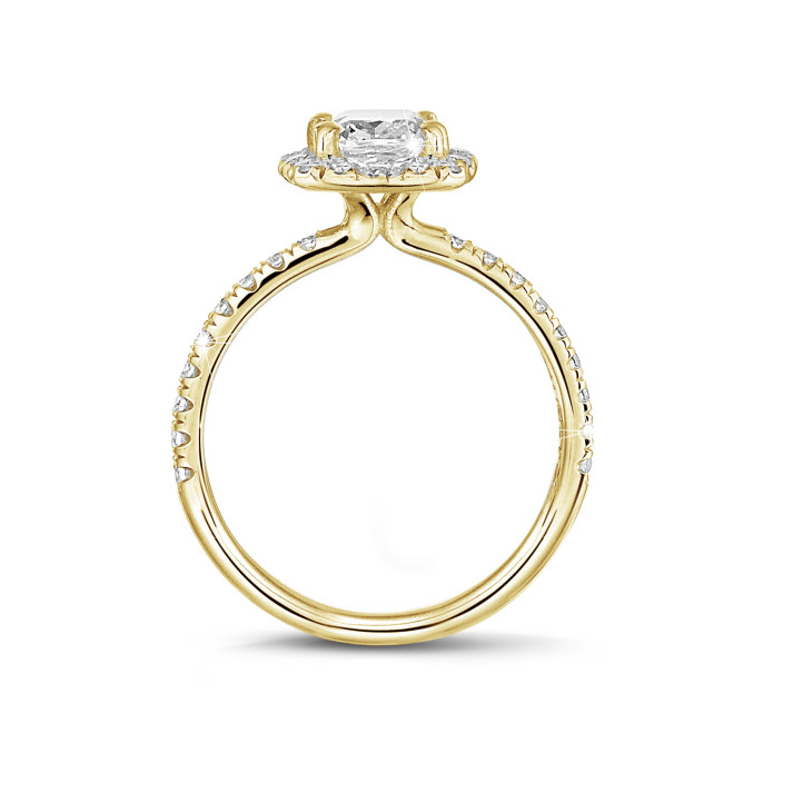 1.00 carat solitaire halo ring with a cushion diamond in yellow gold with round diamonds