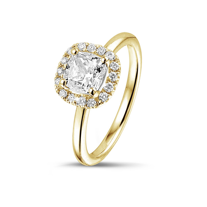 1.20 carat solitaire halo ring with a cushion diamond in yellow gold with round diamonds