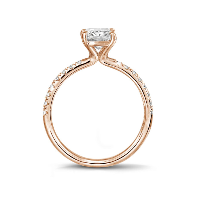 1.50 carat solitaire ring with a cushion diamond in red gold with side diamonds