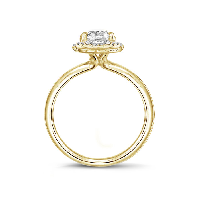 1.50 carat solitaire halo ring with a cushion diamond in yellow gold with round diamonds