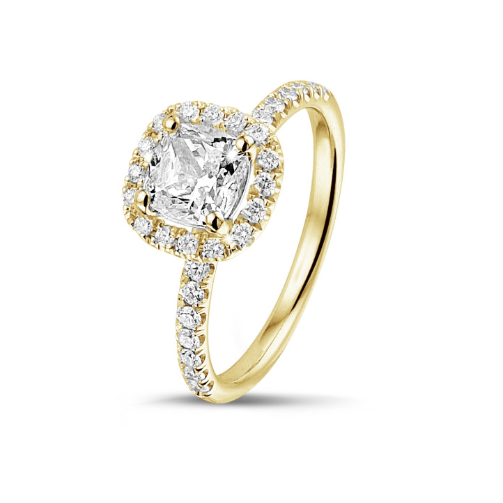 2.00 carat solitaire halo ring with a cushion diamond in yellow gold with round diamonds