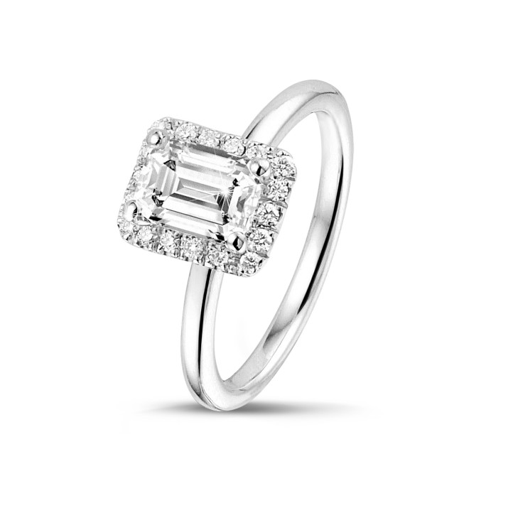 1.00 carat solitaire halo ring with an emerald cut diamond in white gold with round diamonds