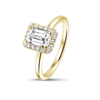 Engagement - 1.00 carat solitaire halo ring with an emerald cut diamond in yellow gold with round diamonds
