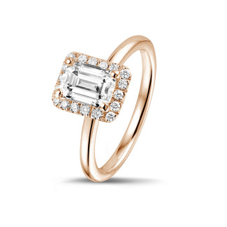 Engagement - 1.00 carat solitaire halo ring with an emerald cut diamond in red gold with round diamonds