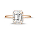 1.00 carat solitaire halo ring with an emerald cut diamond in red gold with round diamonds
