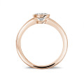 0.90 carat solitaire ring in red gold with round diamond