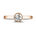 0.90 carat solitaire ring in red gold with round diamond