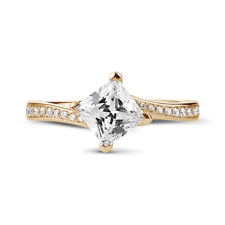 1.50 carat solitaire ring in red gold with princess diamond and side diamonds
