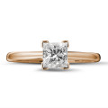 0.90 carat solitaire ring in red gold with princess diamond