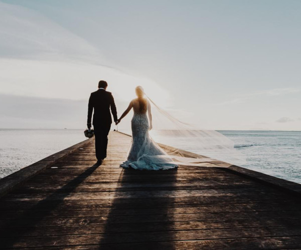 A wedding abroad on a beach. – BAUNAT