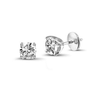 Golden earrings - solitaire earrings in white gold with round diamonds of 0.50 Ct each