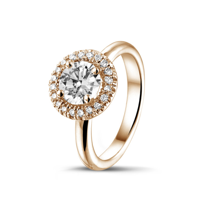 0.90 carat solitaire halo ring in red gold with round diamonds