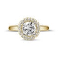 1.00 carat solitaire halo ring in yellow gold with round diamonds