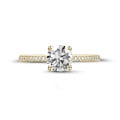 1.00 carat solitaire ring in yellow gold with side diamonds