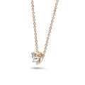 0.70 carat solitaire pendant in red gold with round diamond