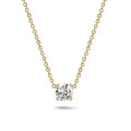 0.70 carat solitaire pendant in yellow gold with round diamond
