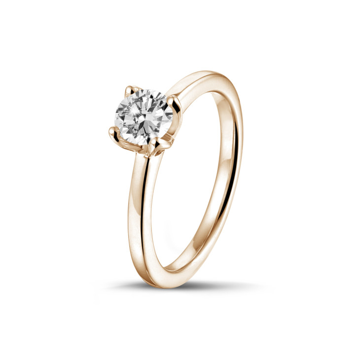 0.50 carat solitaire ring in red gold with round diamond