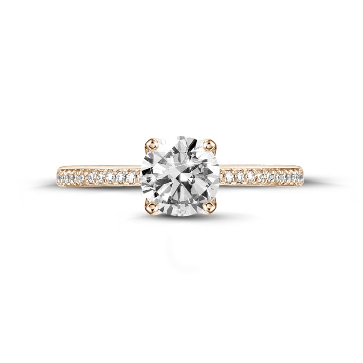 0.50 carat solitaire ring in red gold with side diamonds