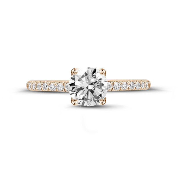 0.70 carat solitaire ring in red gold with side diamonds