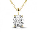 0.58 carat solitaire pendant in yellow gold with oval diamond