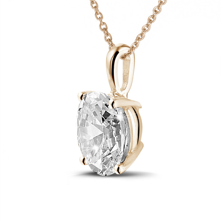 0.70 carat solitaire pendant in red gold with oval diamond