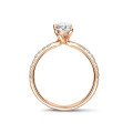1.00Ct solitaire ring in red gold with oval diamond