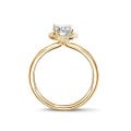 1.20Ct halo ring in yellow gold with oval diamond