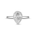 0.70Ct halo ring in white gold with pear diamond