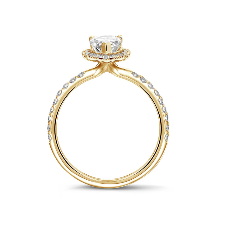 1.00Ct halo ring in yellow gold with pear diamond