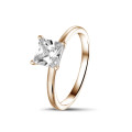 0.70 carat solitaire ring with a princess diamond in red gold