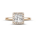 1.00 carat solitaire halo ring with a princess diamond in red gold with round diamonds