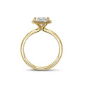 1.20 carat solitaire halo ring with a princess diamond in yellow gold with round diamonds