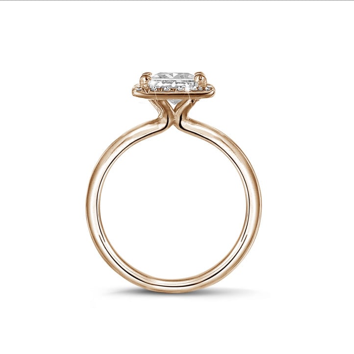 1.20 carat solitaire halo ring with a princess diamond in red gold with round diamonds