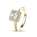 1.50 carat solitaire halo ring with a princess diamond in yellow gold with round diamonds