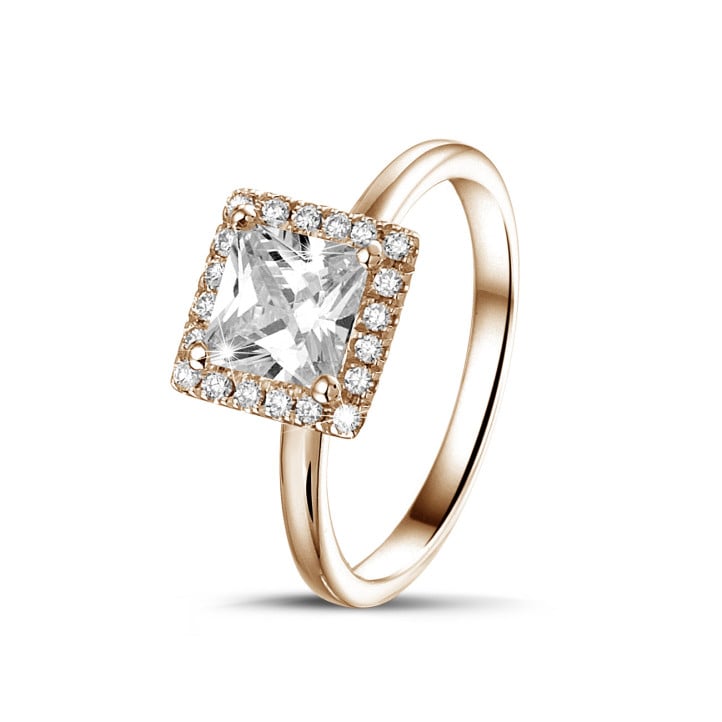 1.50 carat solitaire halo ring with a princess diamond in red gold with round diamonds