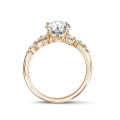 1.00 carat solitaire cluster ring in red gold with a round diamond