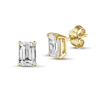 Earrings - 2.00 carat solitaire emerald cut diamond earrings in yellow gold