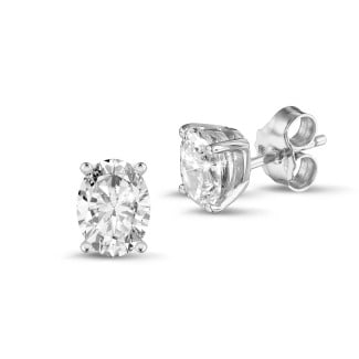 Earrings - 2.00 carat solitaire oval cut diamond earrings in white gold