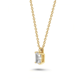 Necklaces - 1.00 carat solitaire emerald cut diamond pendant in yellow gold