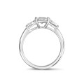 1.00 carat trilogy ring in platinum with an emerald cut diamond and tapered baguettes