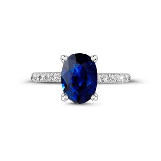 Engagement - Ring in white gold with oval sapphire and side diamonds