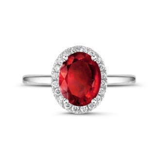 Engagement - Halo ring in white gold with an oval ruby