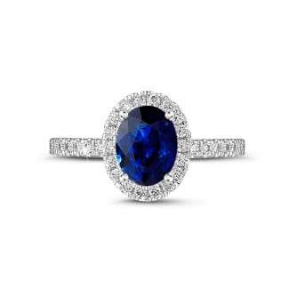Engagement - Halo solitaire ring in white gold with an oval sapphire and small diamonds