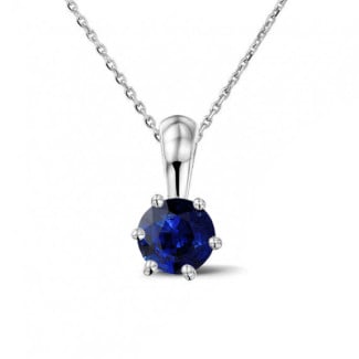 Necklaces - Solitaire pendant in white gold with a round sapphire