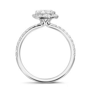 Engagement - 1.00 carat solitaire halo ring with a radiant cut diamond in white gold with round diamonds
