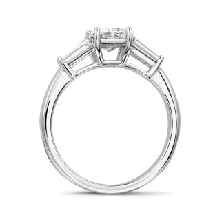 Engagement - 1.00 carat trilogy ring in white gold with a radiant cut diamond and tapered baguettes