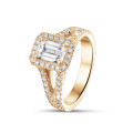 1.00 carat solitaire ring in red gold with an emerald cut diamond and side diamonds