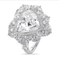 Bespoke entourage ring with a heart shaped diamond