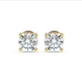 2.00 carat solitaire earrings with round diamonds in yellow gold