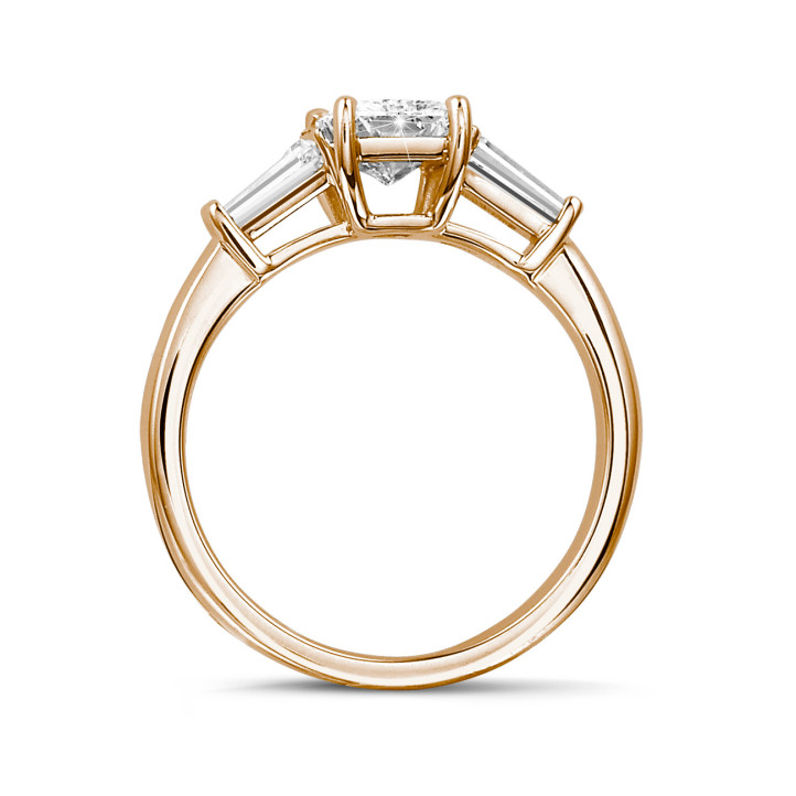 1.50 carat trilogy ring in red gold with a radiant cut diamond and tapered baguettes